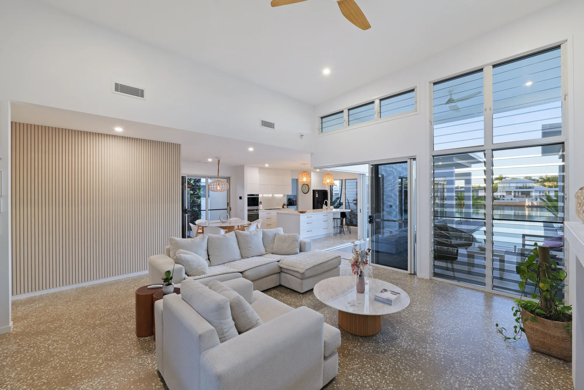 Living and dining beneath raked ceilings