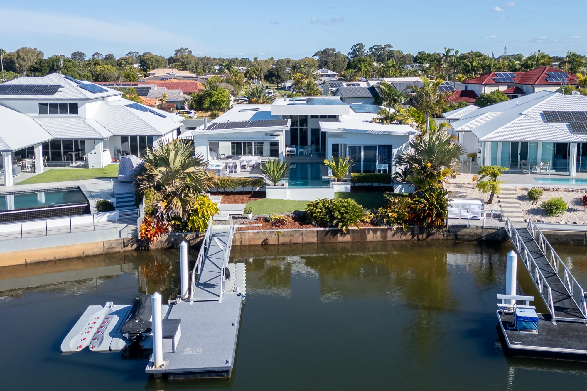 Aerial view of the home and pontoon
